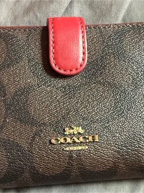 Coach Brown Signature Wallet with Red Tab and Gold Logo
